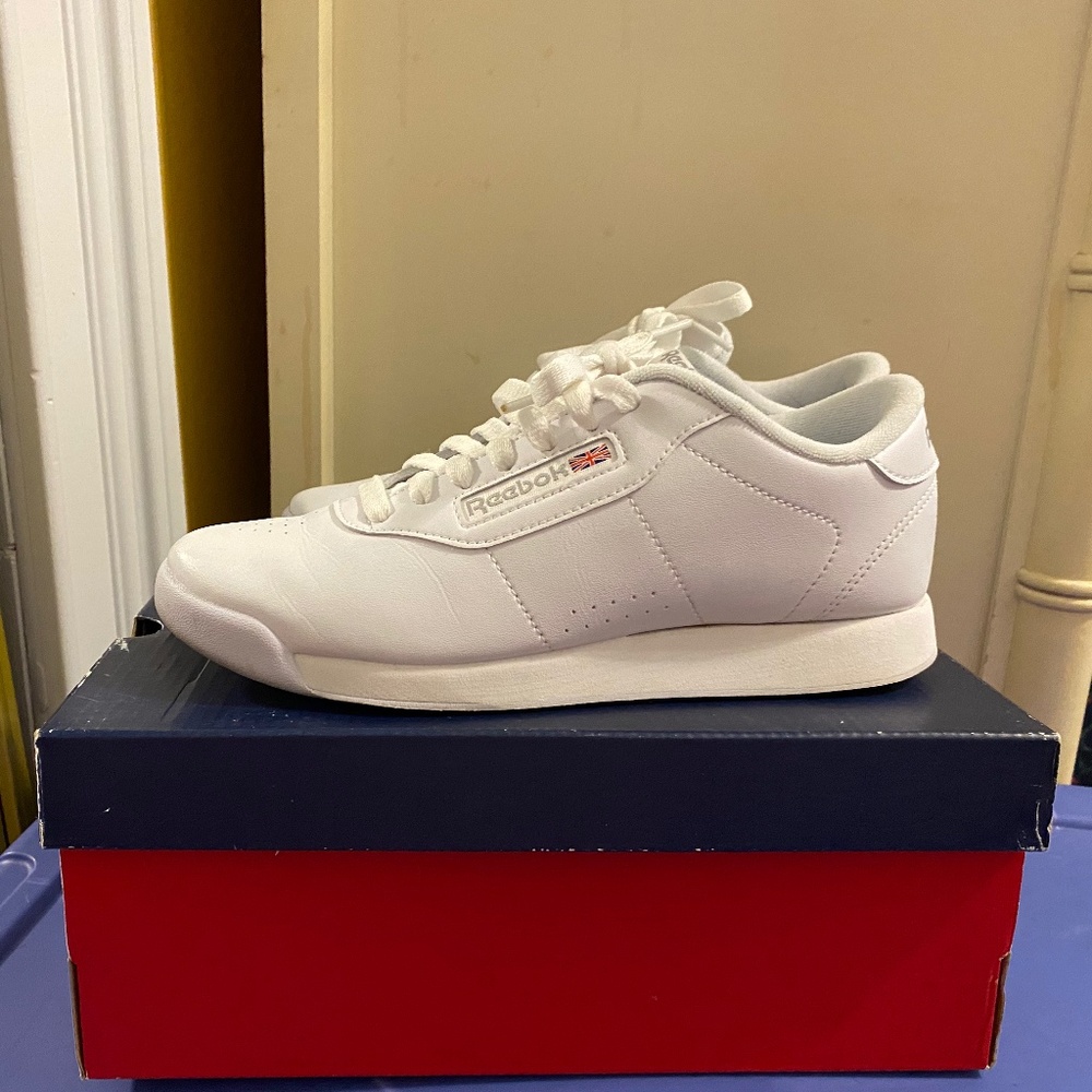 White pair and black pair of Reebok